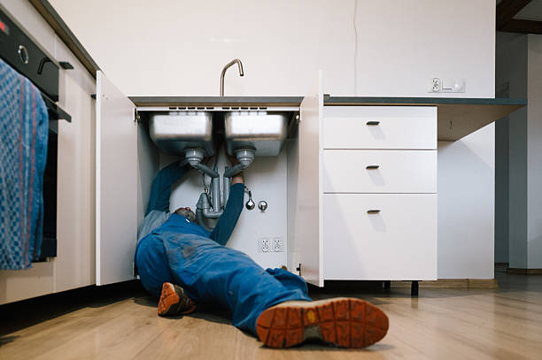 Professional Emergency Plumber technician working in Forked River, NJ